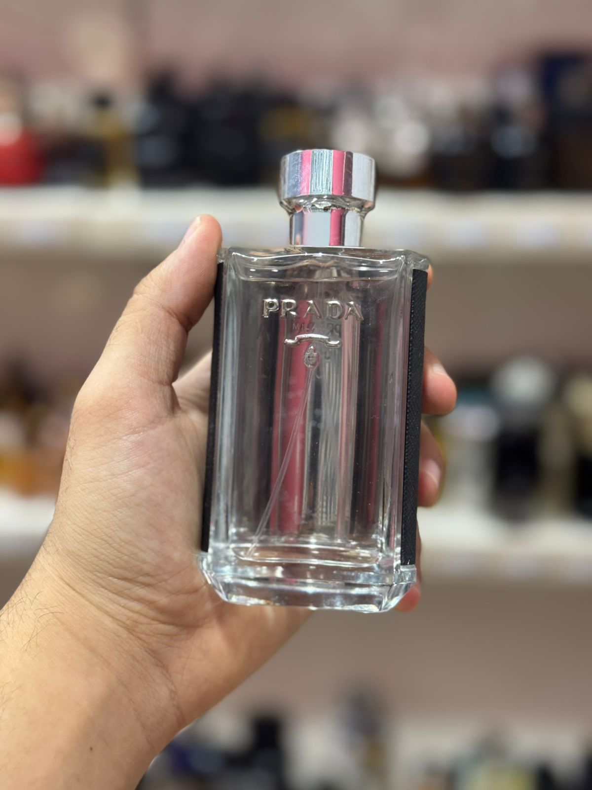 prada l'homme 100ml  (complet sans emballage)