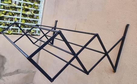 نشار الملابس الحائطي القابل للطي