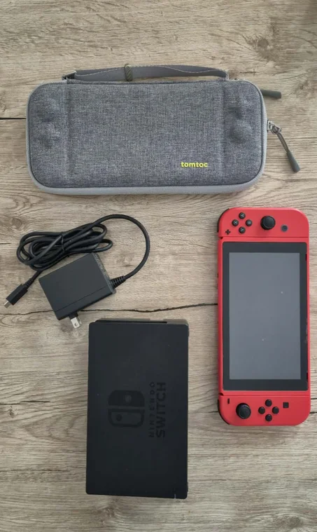 Nintendo Switch Édition Spéciale Mario (Rouge) – ZÉRO Égratignure + Pochette Tomtoc