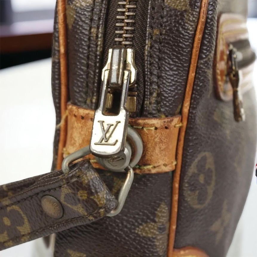 LOUIS VUITTON Marly Dragonne Clutch | Condition: Used