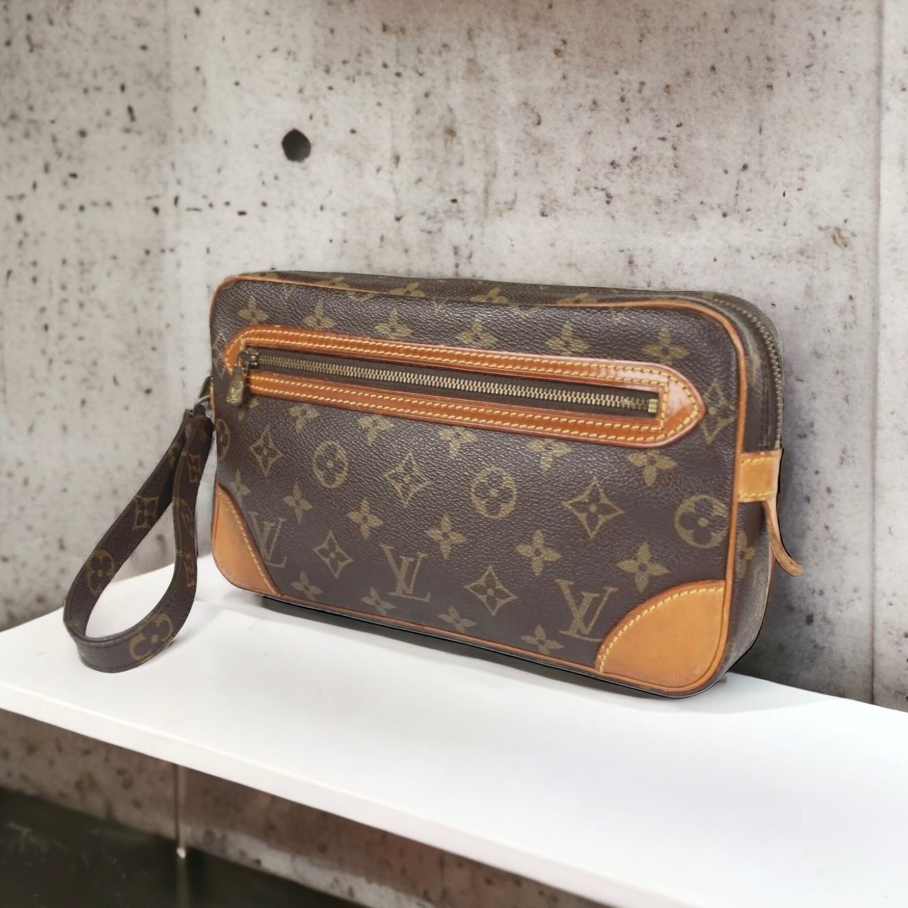 LOUIS VUITTON Marly Dragonne Clutch | Condition: Used