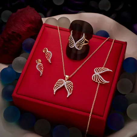 عقد + أقراط + خاتم + سوار + براسلي