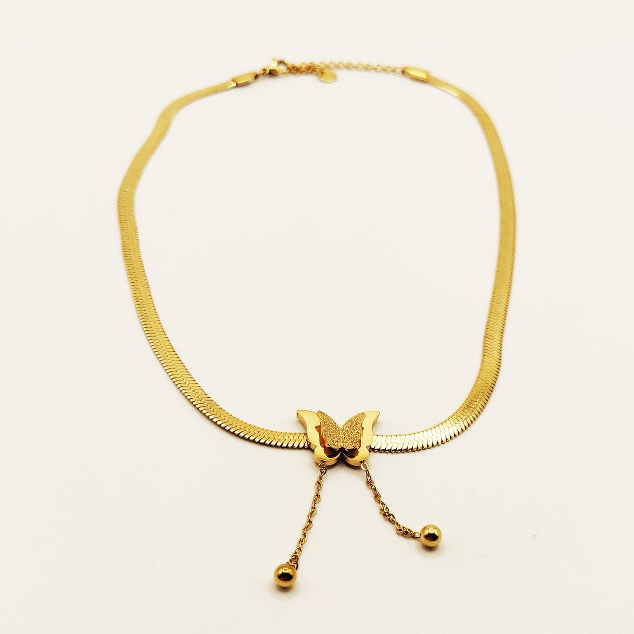 Collier papillon doré en acier inoxydable