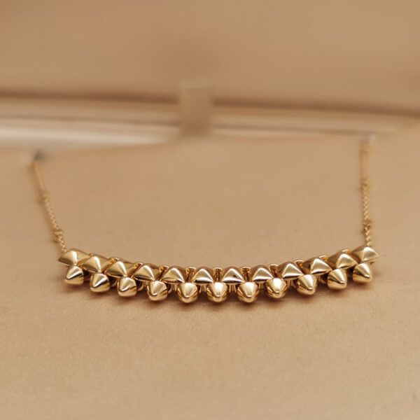 Collier cartier clash doré en acier inoxydable
