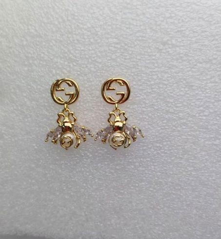 Boucles d'oreilles doré  acier GUCCI GG