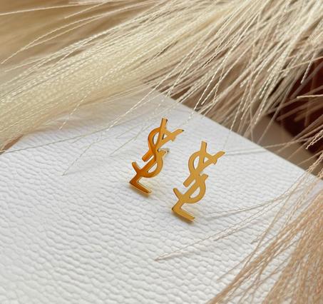Boucles d'oreilles YVES SAINT LAURENT en acier inoxydable