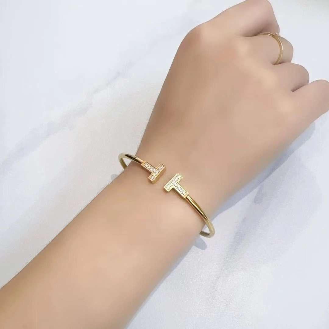 Bracelet femme Tiffany & Co TT en acier inoxydable