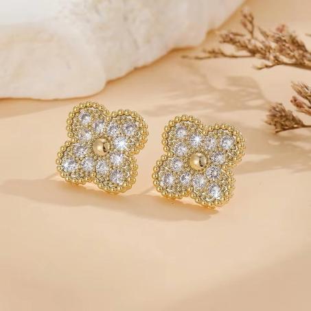 Boucles d'oreilles Van cleef doré en acier inoxydable