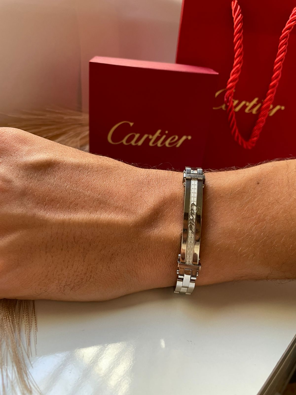 Bracelet hommes Cartier en acier avec packaging complet
