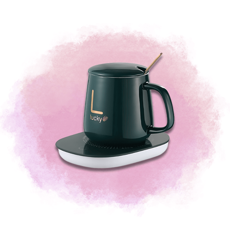 Tasse verte avec un auto-chauffant