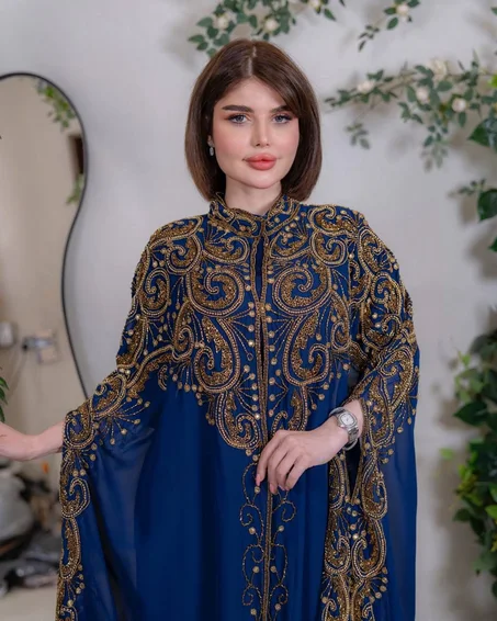 عباية سواريه فاخرة باللون الأزرق مع تطريز ذهبي أنيق