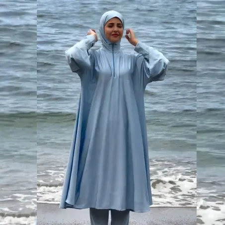 🌊 بوركيني بالتقاشر عصري للمحجبات🧕 تصميم راقٍ يمنحكِ إطلالة محتشمة ومميزة على الشاطئ والمسبح.💦 مقاوم للماء👗 تغطية كاملة💎 جودة عالية وراحة مثالية