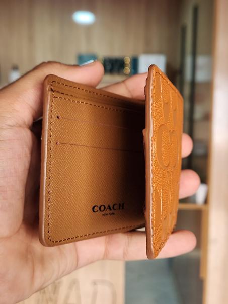 Porte feuilles coach
