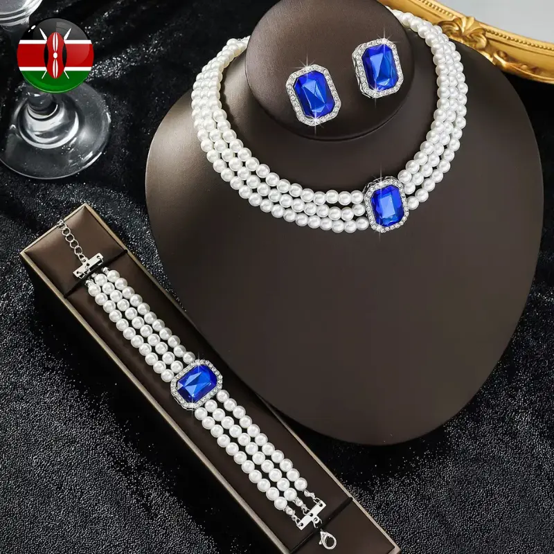 Elegant Jewelry Set with Pearls and Rhinestones: Necklace, Bracelet, and Earrings