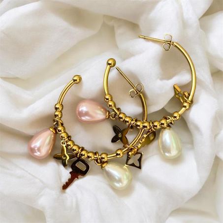 boucles d’oreilles arrondies avec suspensions