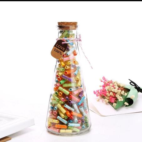 بوقالات التقاليد – فن الرسائل في وعاء زجاجي