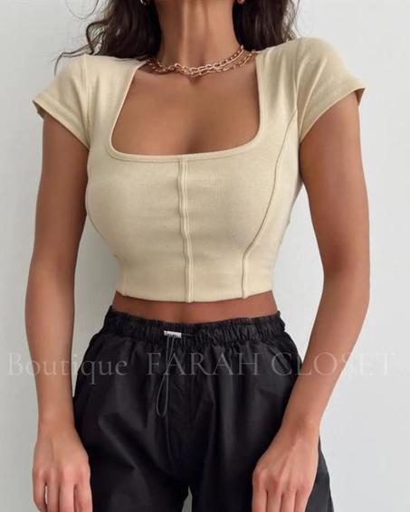 قميص نسائي بأكمام قصيرة