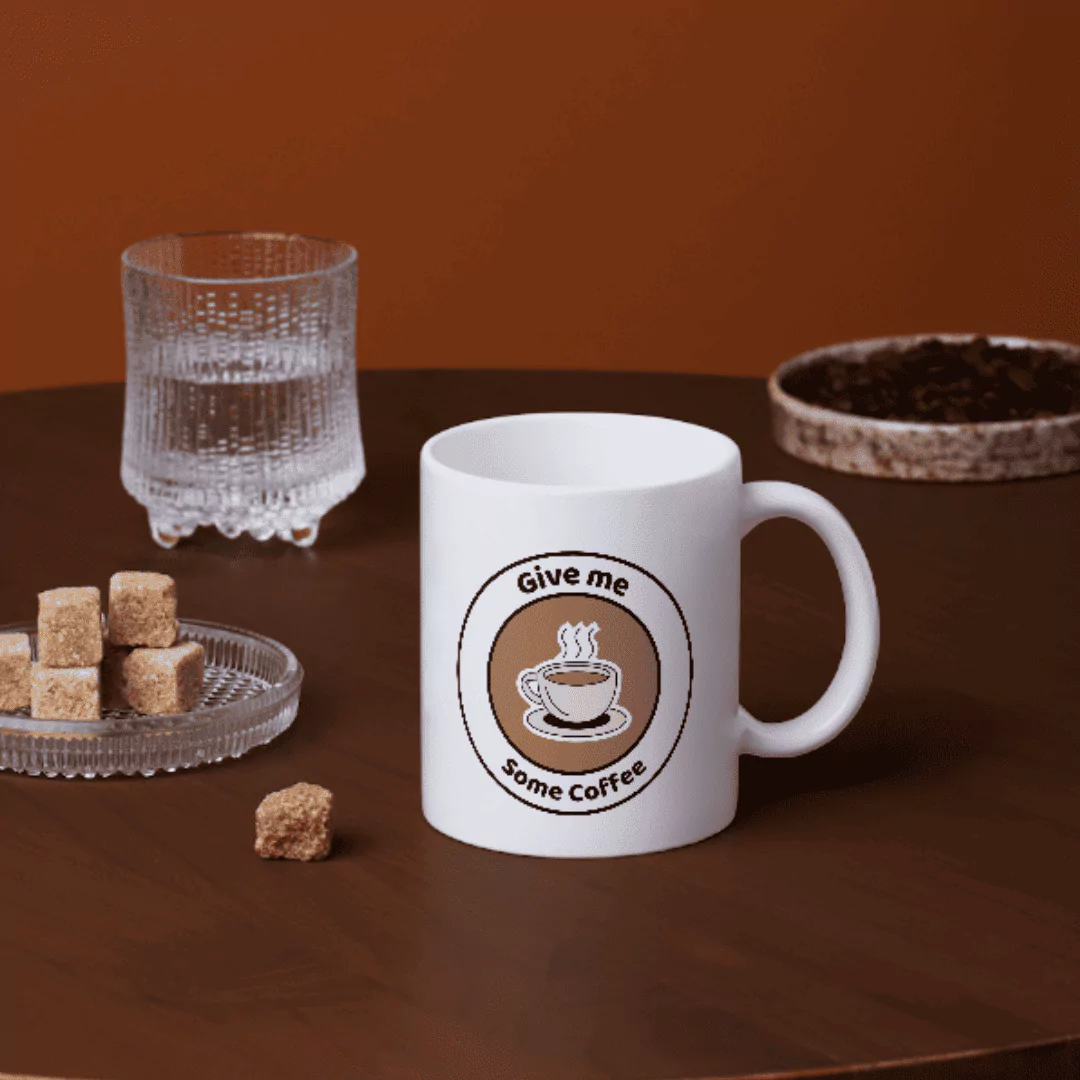 "Give me some coffee" كوب قهوة مع اقتباس تحفيزي