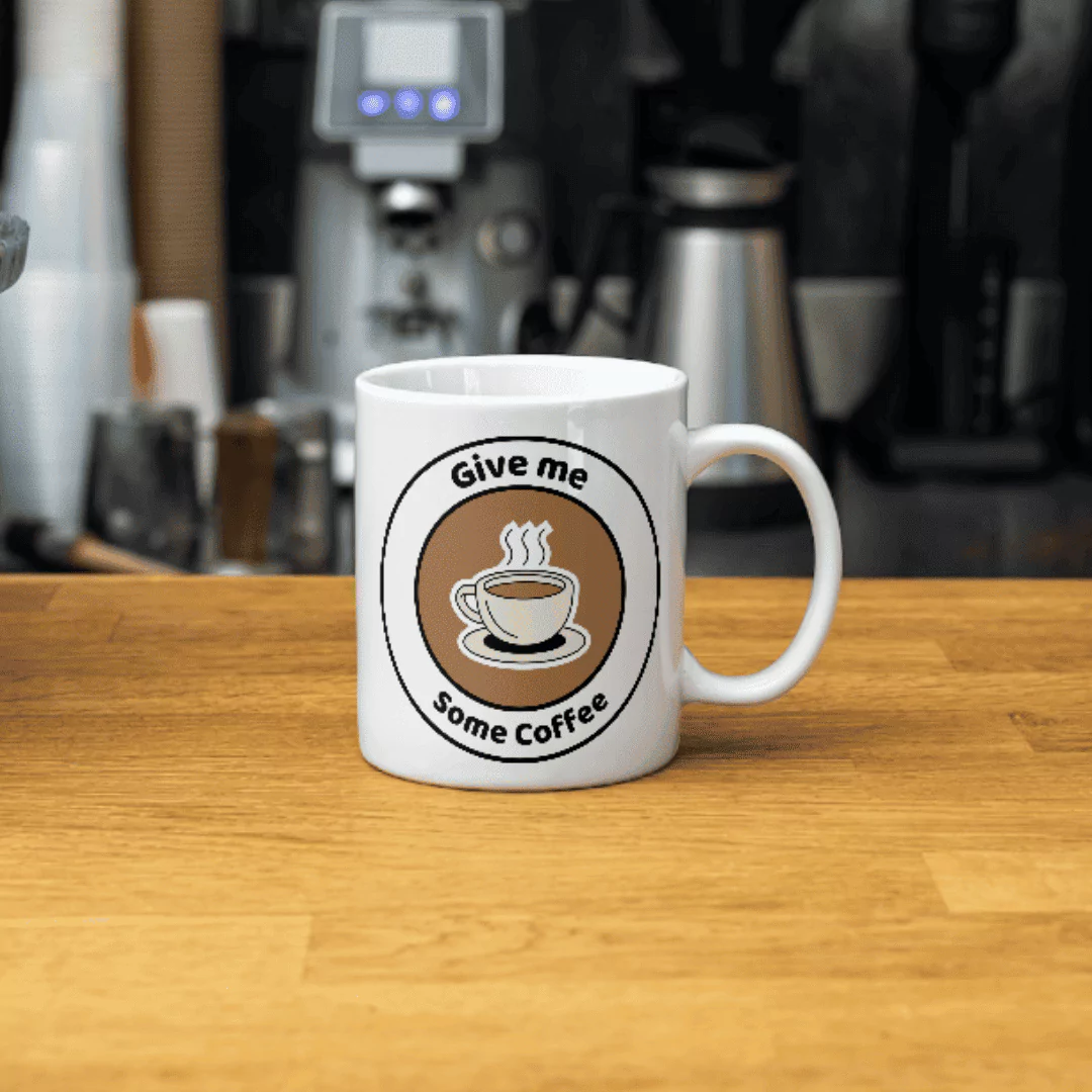 "Give me some coffee" كوب قهوة مع اقتباس تحفيزي
