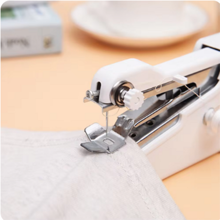 آلة خياطة يدوية