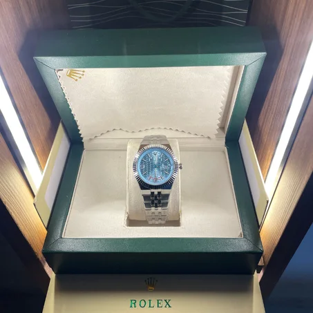 ROLEX tableu bleu ciel  + packaging coffret