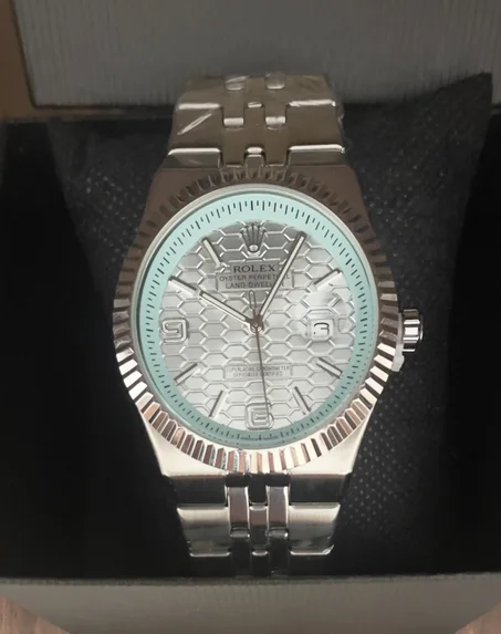 ROLEX tableau bleu ciel + packaging simple