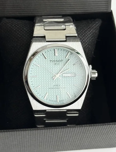 TISSOT tableau bleu ciel + packaging simple