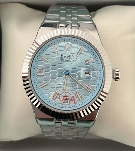 ROLEX 2025  tableau bleu ciel + packaging simple
