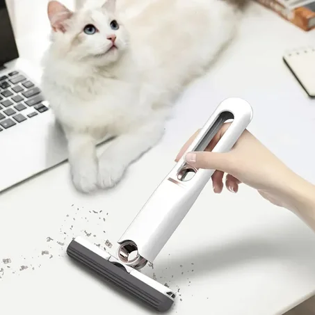 ممسحة يدوية صغيرة للزجاج و الطاولات