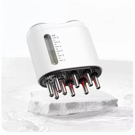 أداة وضع زيت الشعر