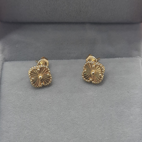 boucle d'oreille en or 18 carats