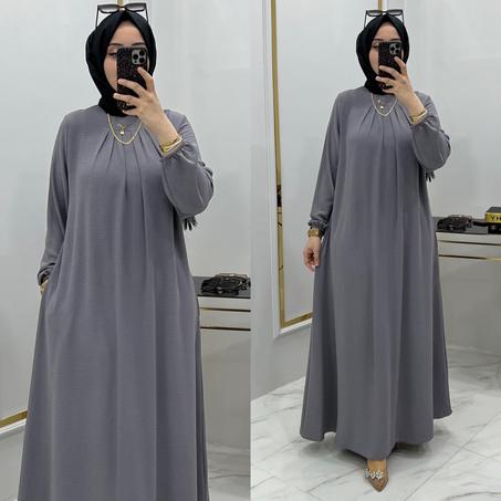 عباءة أنيقة  بأكمام طويلة و أساور مطاطية