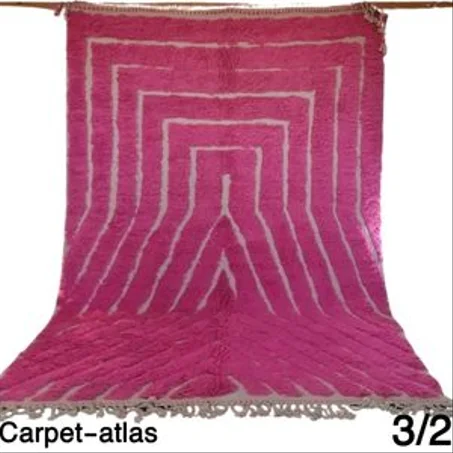Handmade Moroccan rug made of Berber wool, pink color.