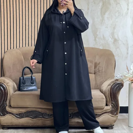 تألقي بالدفء والفخامة: أنسومبل "كطيفة" الشتوي المخطط