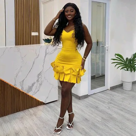 Luxury Chic Sleeveless Bodycon Dress with Ruffle Hem