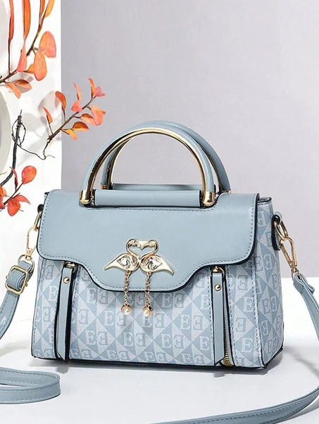 حقيبة يد "لوكس" الأنيقة بلمسة "البجعة" الذهبية – تصميم عصري لكل المناسبات