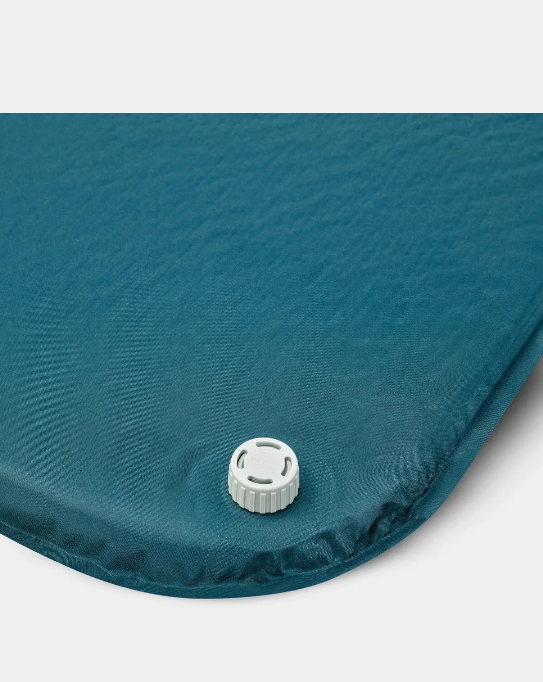 Tapis Gonflable  Autogonflant de la Marque Quechua pour Camping. Compact, léger, facile à transporter et pratique.