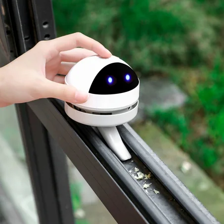 المكنسة الكهربائية المصغرة