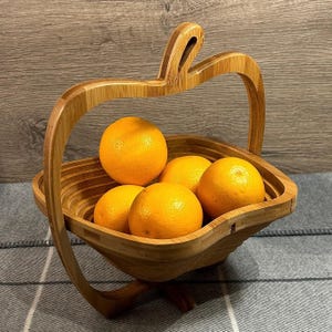 "قفة فواكه سحرية من الخيزران – تصميم كيتطوى وكيزيّن مائدتك" 🍎