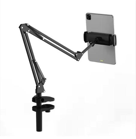 حامل الهاتف والتابليت على الطاولة والسرير