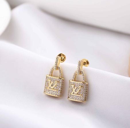 Boucles d'oreilles doré LOUIS VUITTON + Packaging LV
