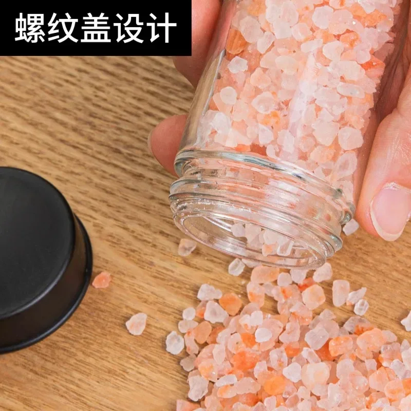 ‏رف توابل دوار أسود لكونترتوب المطبخ