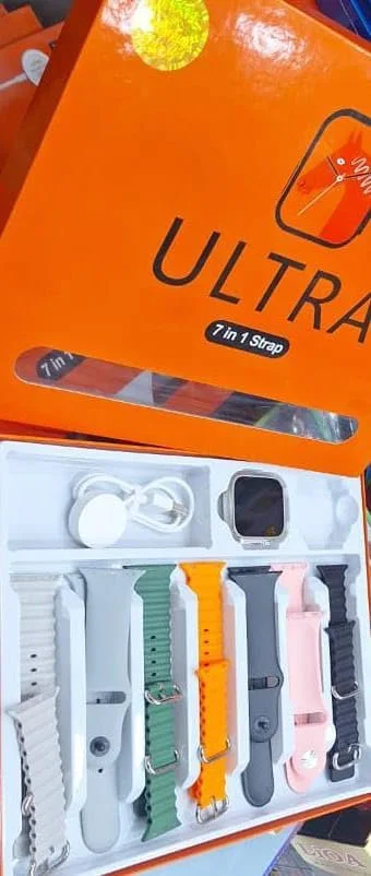 ساعة ذكية 7 في 1/ للرجال والنساء / مع 7 اساور اضافية عالية الجودة ومينا 49 ملم مع شاحن سريع، استمتع مع علبة تيتانيوم للشحن اللاسلكي 49 ملم برتقالي للرجال والنساء.