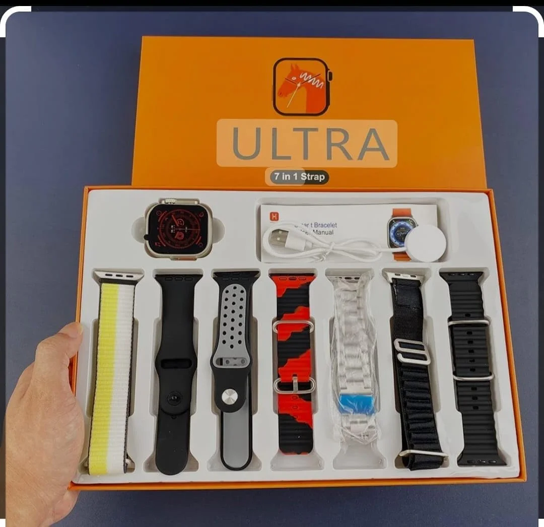 ساعة ذكية 7 في 1/ للرجال والنساء / مع 7 اساور اضافية عالية الجودة ومينا 49 ملم مع شاحن سريع، استمتع مع علبة تيتانيوم للشحن اللاسلكي 49 ملم برتقالي للرجال والنساء.