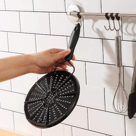 Plaque conductrice thermique pour cuisinière à gaz