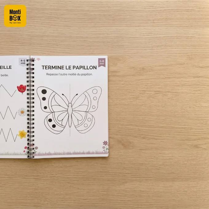 Gros plan sur la reliure spirale et le pelliculage du cahier MontiBox
