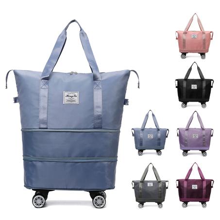 شنطة سفر عملية وعصرية – مقاومة للماء + مساحة إضافية