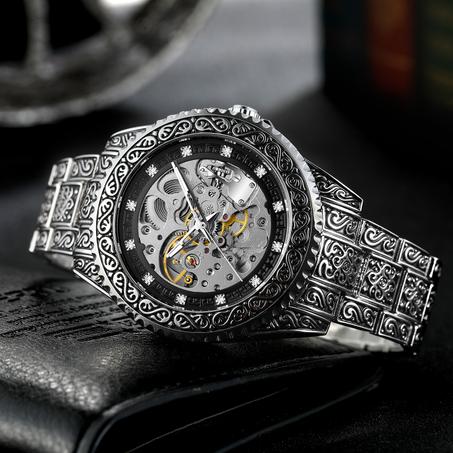 ساعة ميكانيكيو مزخرفة لون رمادي