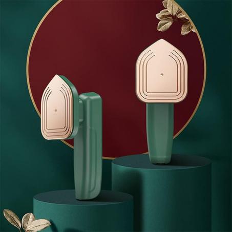 مكواة الملابس المحمولة