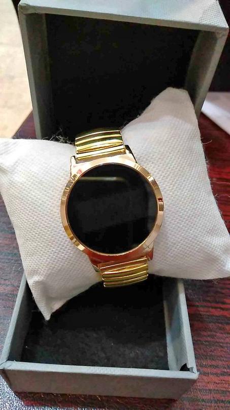 ساعة تاتش دائرية ذهبي